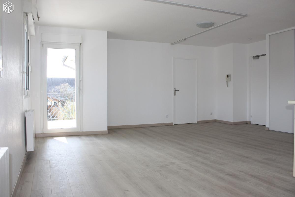 Appartement F2 avec balcon, parking et garage