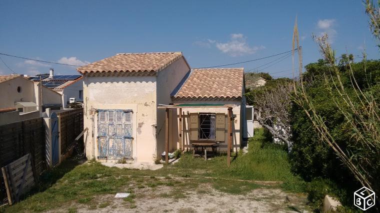 Maison bord de mer, pieds dans l'eau