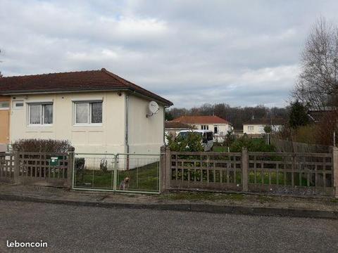 Maison mitoyenne d'un cote